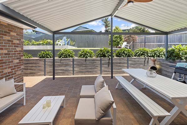 Outdoor area with BBQ and seating